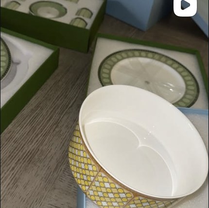 An HHR Home gold trellis serving bowl, boxed